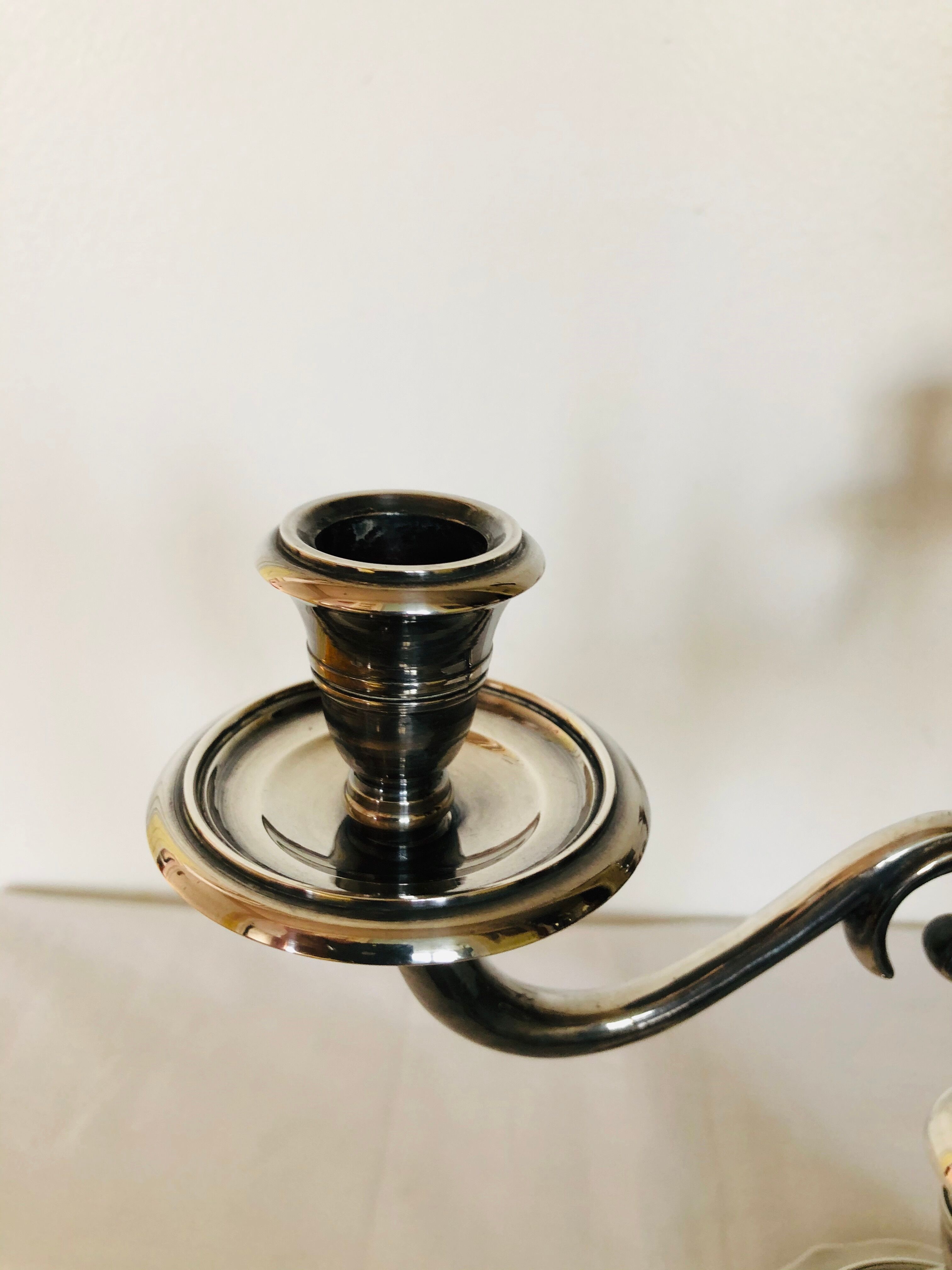 Pair of silver metal candlesticks