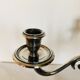 Pair of silver metal candlesticks