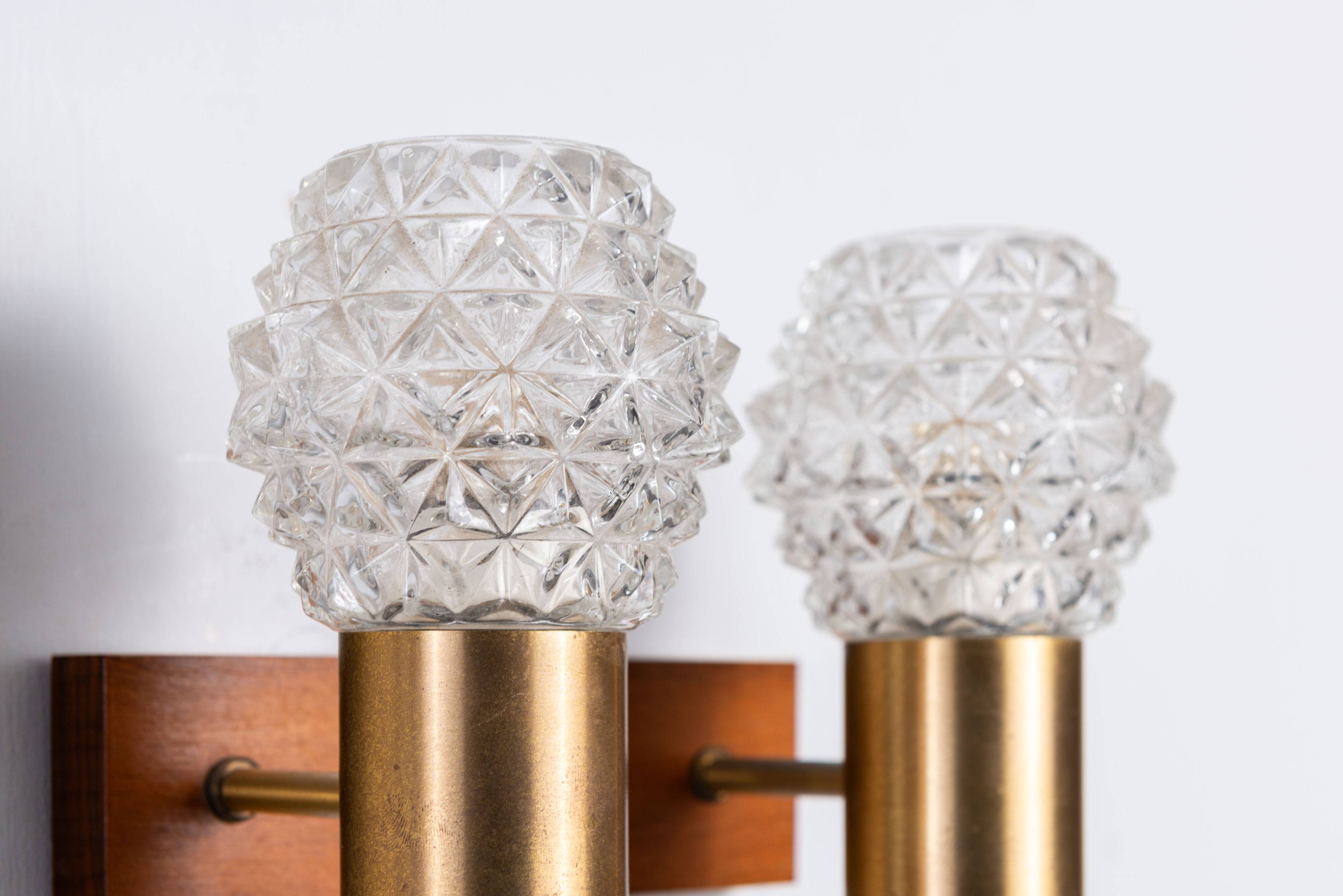 Pair of Swedish wall lamps with teak wood, brass and glass cup shade