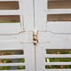 Pair of old shutters with louvers