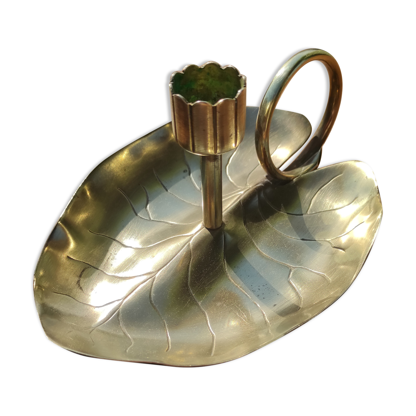 Vintage candle holder in golden brass