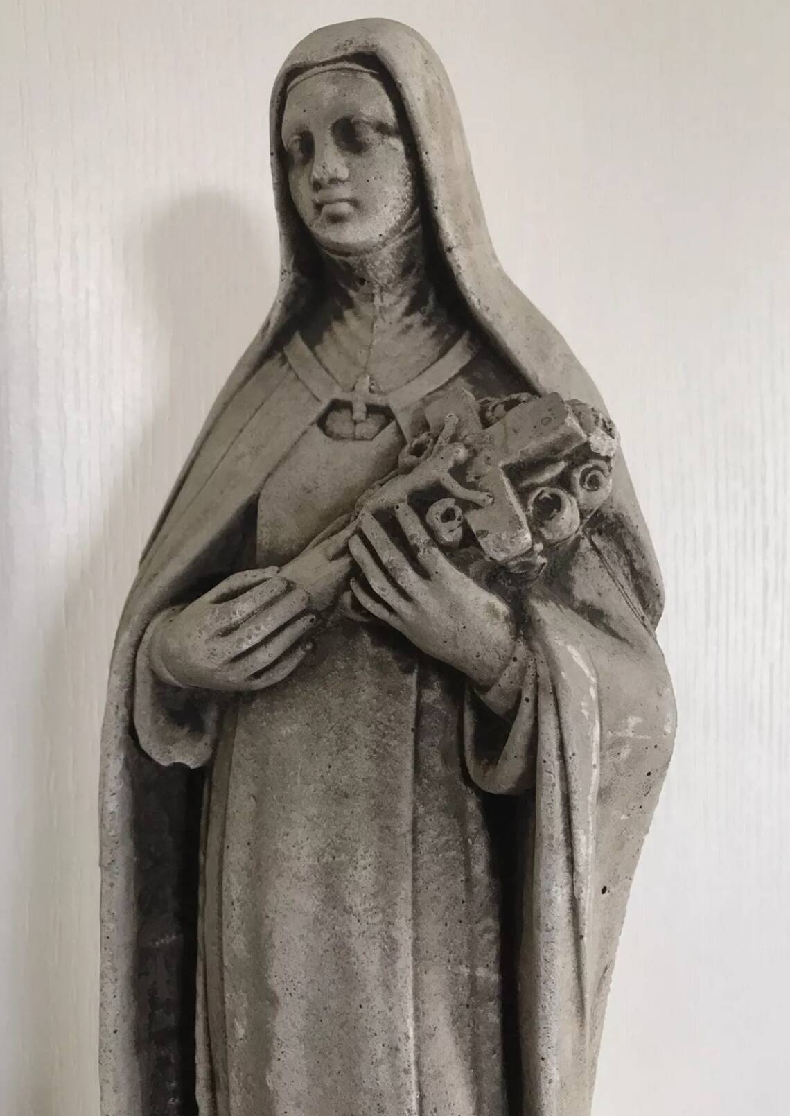 Religious statue of sainte therese of lisieux “the little flower of jesus” in stone
