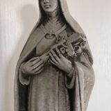 Religious statue of sainte therese of lisieux “the little flower of jesus” in stone