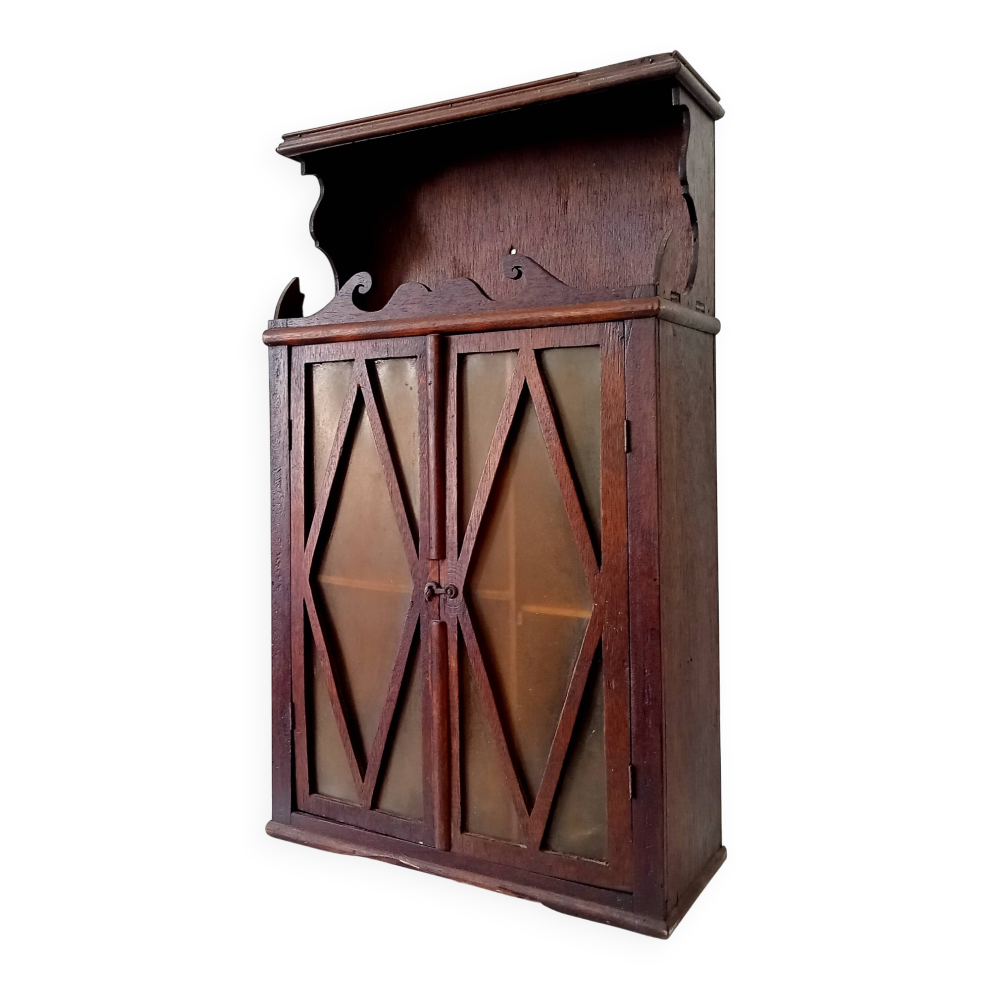 Small antique wall cabinet in Gothic style.