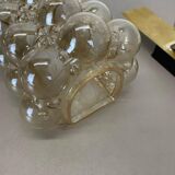 Amber vintage glass wall lamp by Helena Tynell for Glashütte Limburg, 1970s