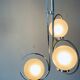 Lampe art déco en argent avec trois abat-jours en forme de sphère