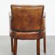 Amazing cognac-coloured sheepskin dining/side chair with armrests