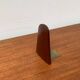 Mid-century Scandinavian bookends in teak and brass.
