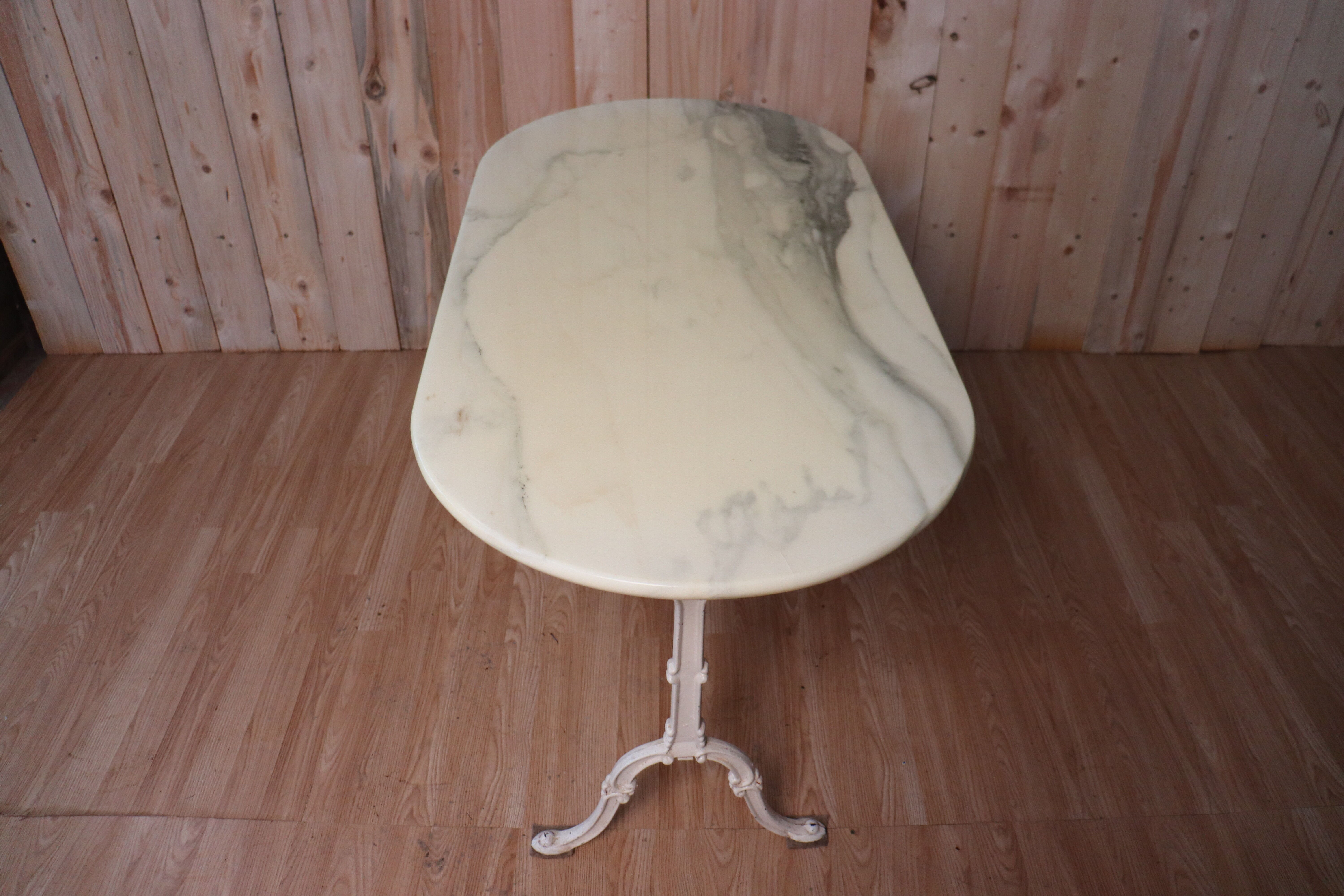 Bistro table with marble tray and wrought iron feet