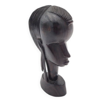 Ancient African sculpture of a woman's head in ebony