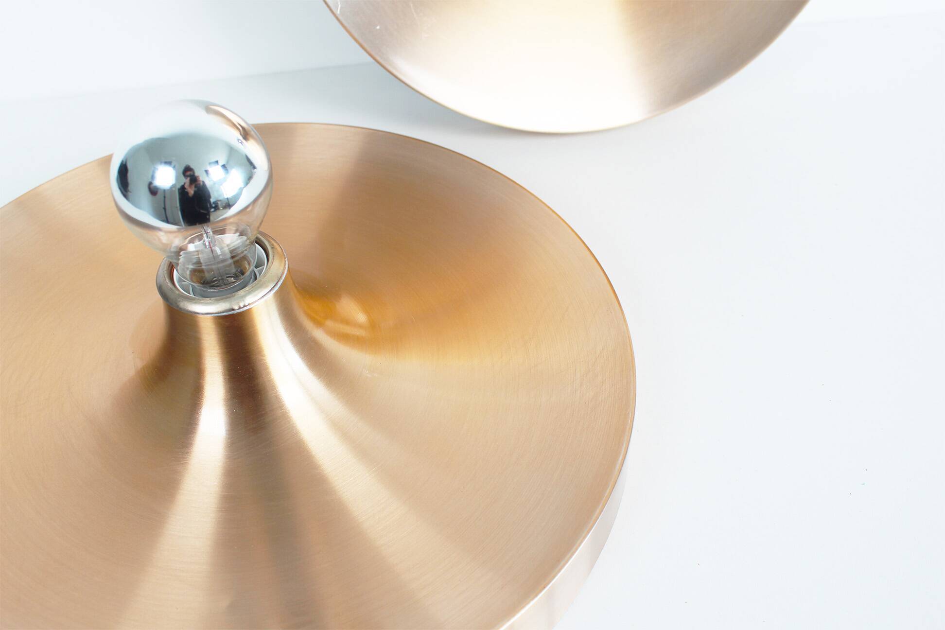 Pair of medium sized (35cm) rose gold Honsel Disc sconces selected by Charl
