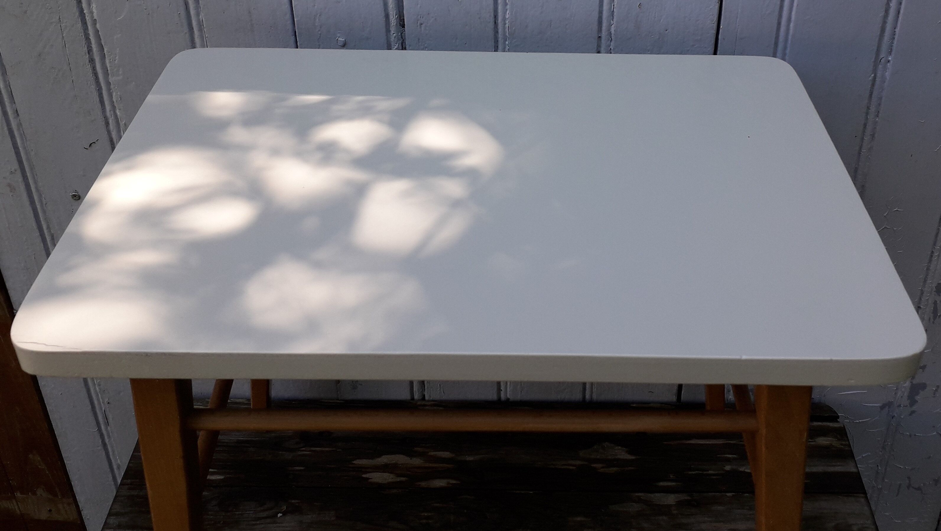 Wooden coffee table and grey tray