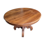 Extendable walnut table in the Napoleon III style.
