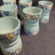 Antique painted wooden egg cups, set of six from the 1930s.