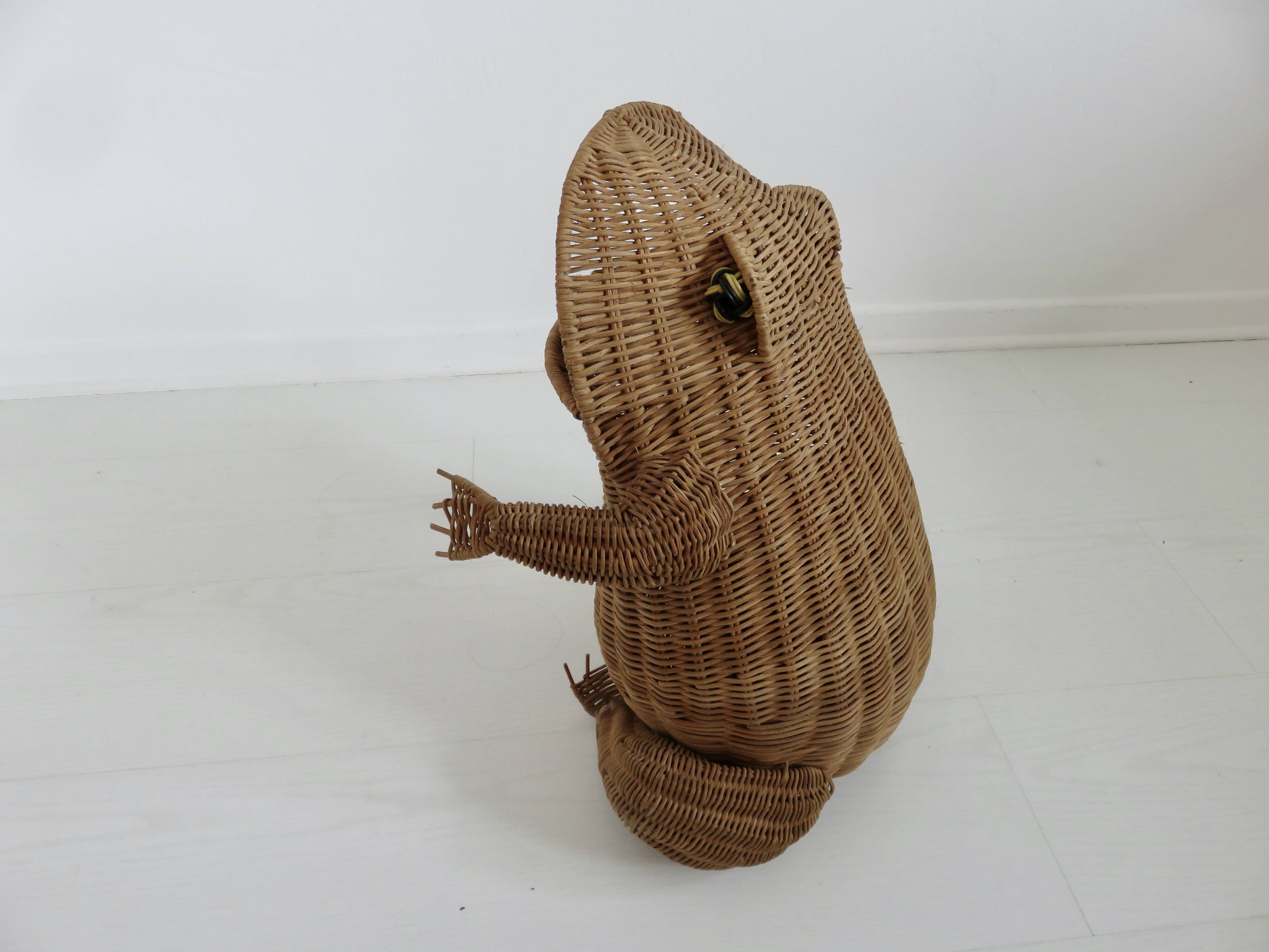 Magazine rack, design by Olivier Cajan, in wicker rattan, 1970s.