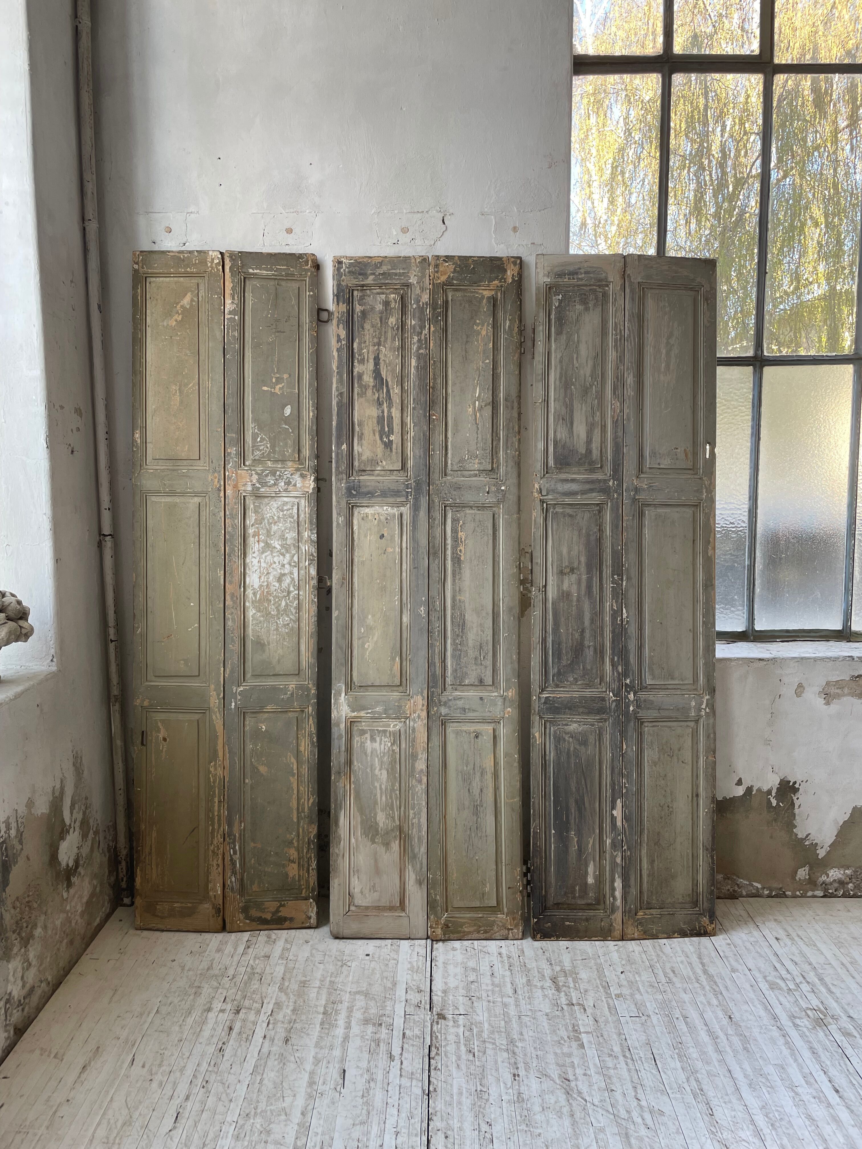 Trio of shutters louvers patina blue gray