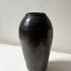 Brown-black glazed stoneware vase, signed underneath the base, circa 1950.