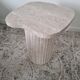 Alpha side table irregular natural travertine ribbed foot