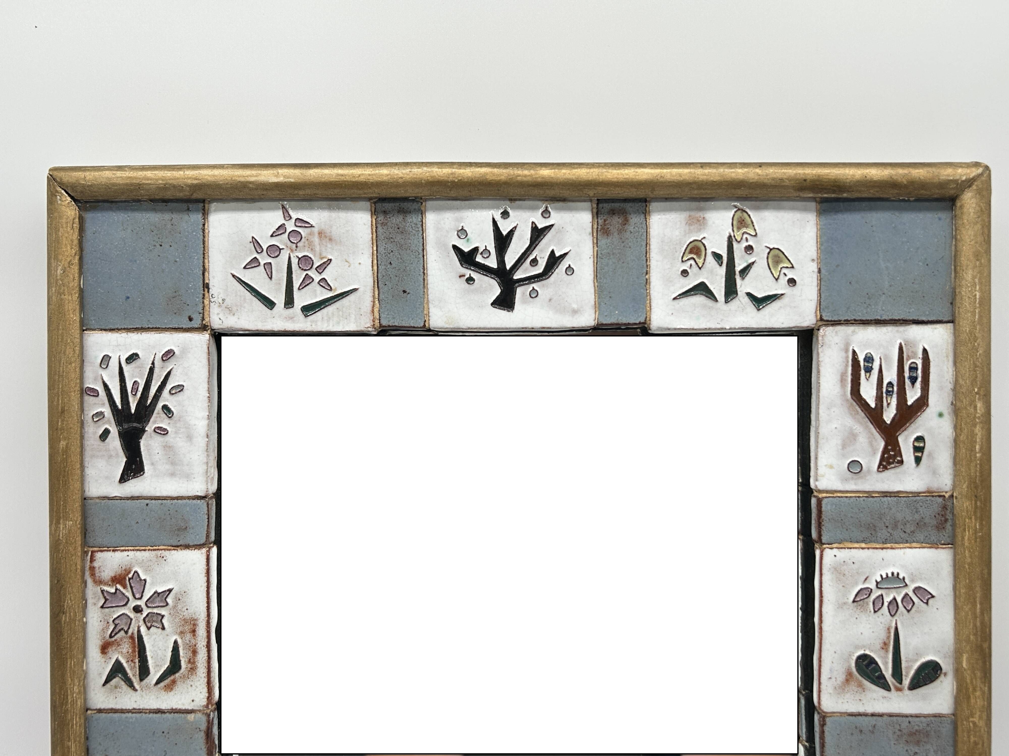 Ceramic enamelled mirror in the style of Odette Dijeux.