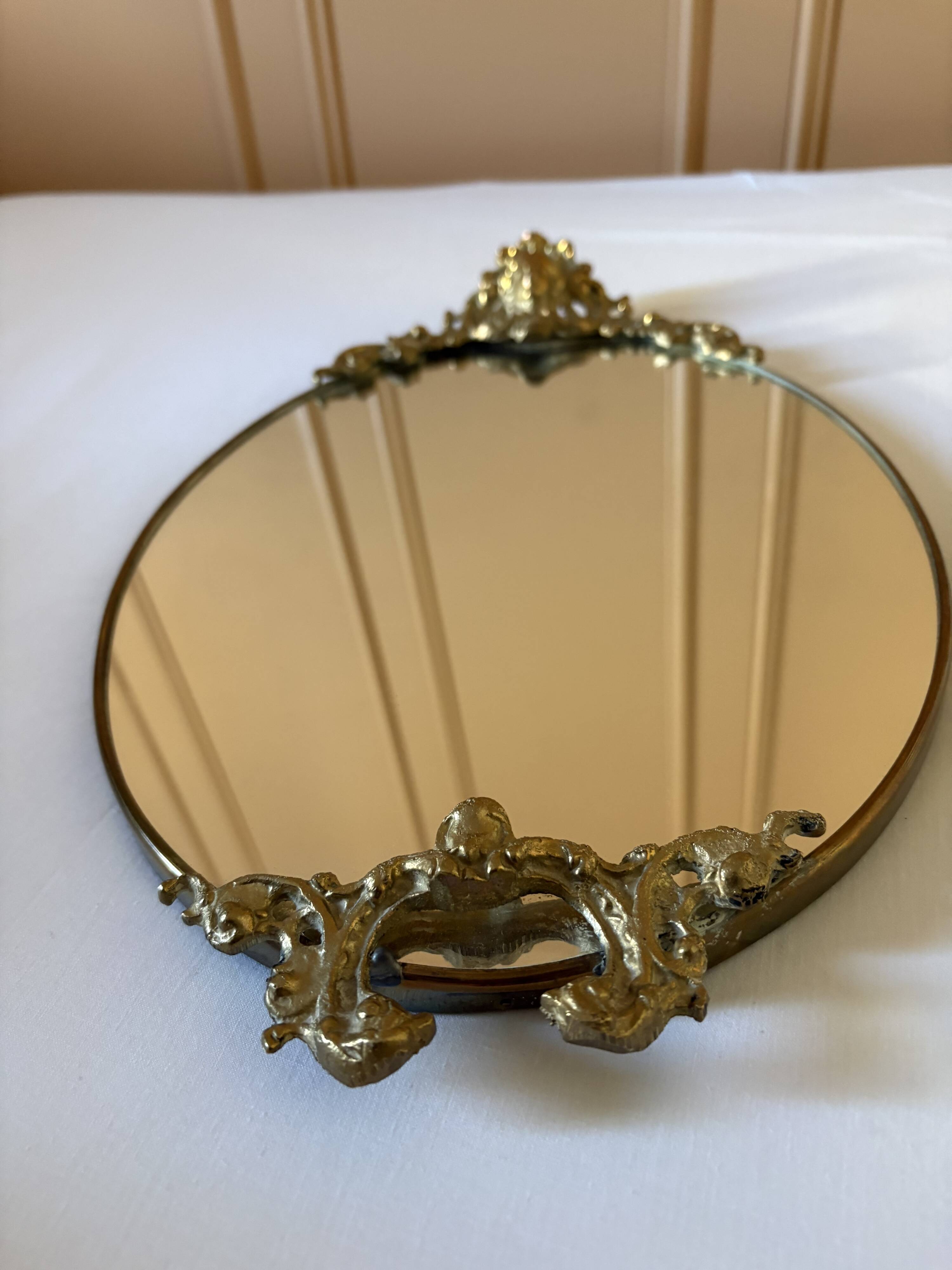 Elegant old oval mirror