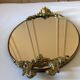 Elegant old oval mirror