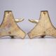 Solid brass dolphin console feet.