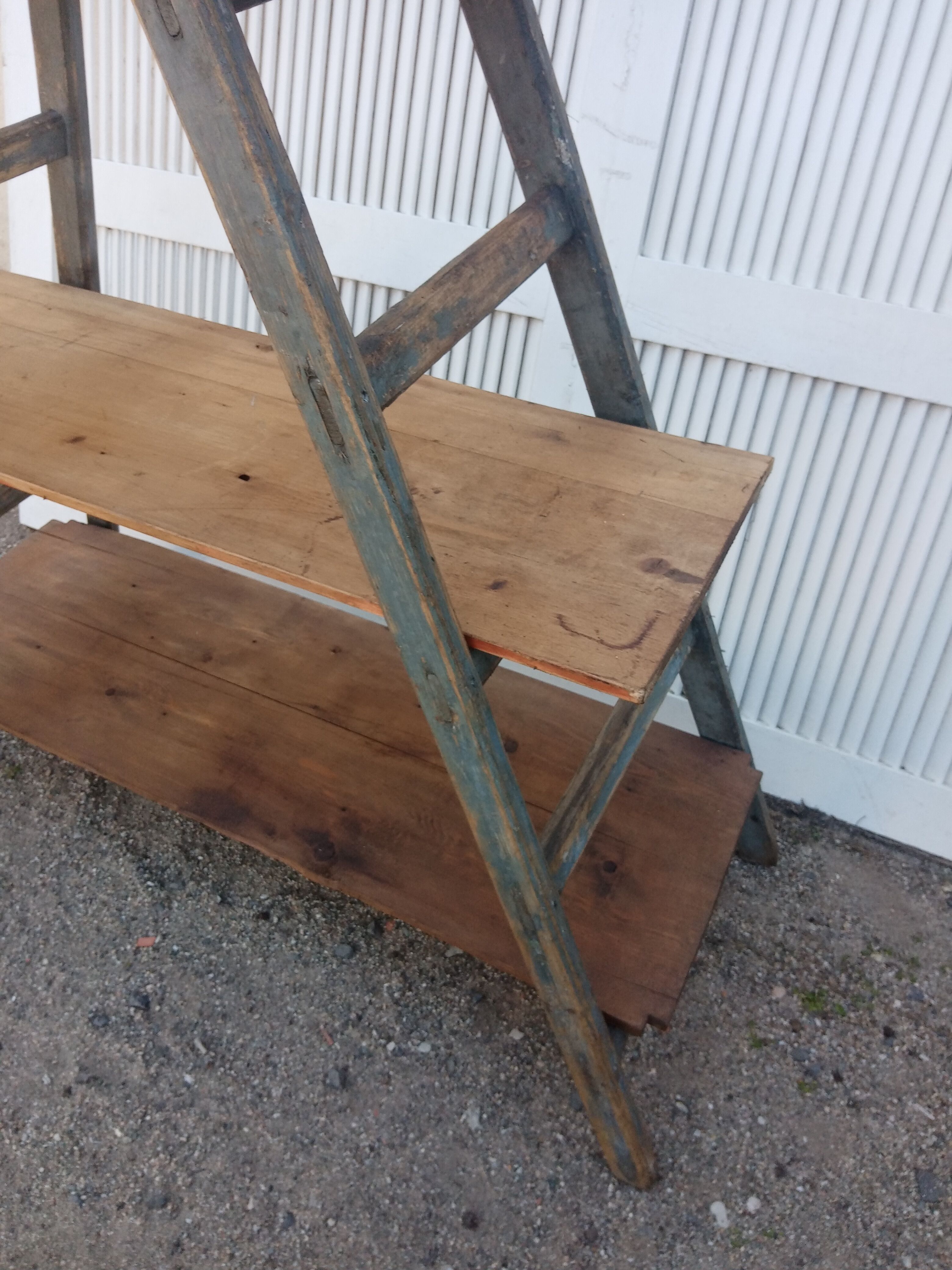 Old stepladder wooden shelf