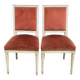 2 Louis XVI chairs in solid wood and orange velvet.