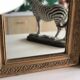 Miroir Louis Philippe en stuc doré