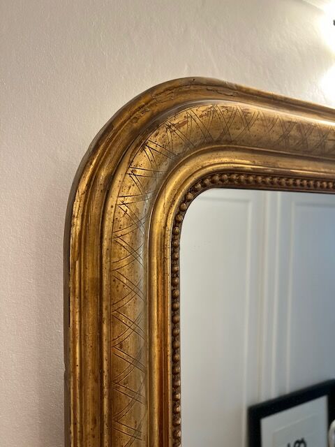 Old mirror Louis-Philippe in gilded wood