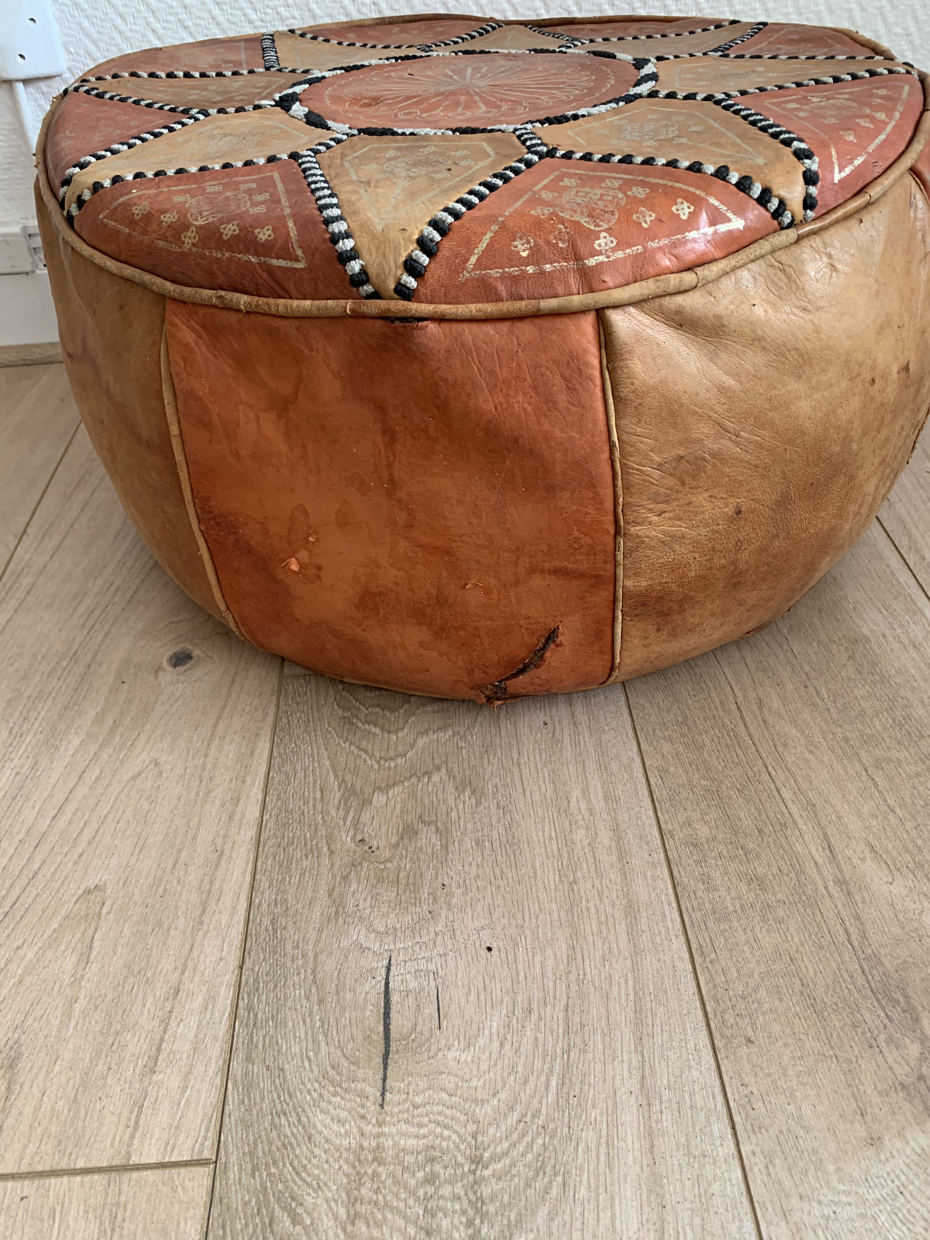 Vintage moroccan leather pouf