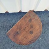 Pretty wooden stool with half moon seat and turned wooden tripod base