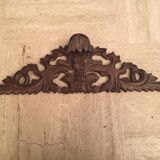 Former finely carved wooden pediment