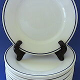 Suite of twelve (12) hotel-grade porcelain table plates