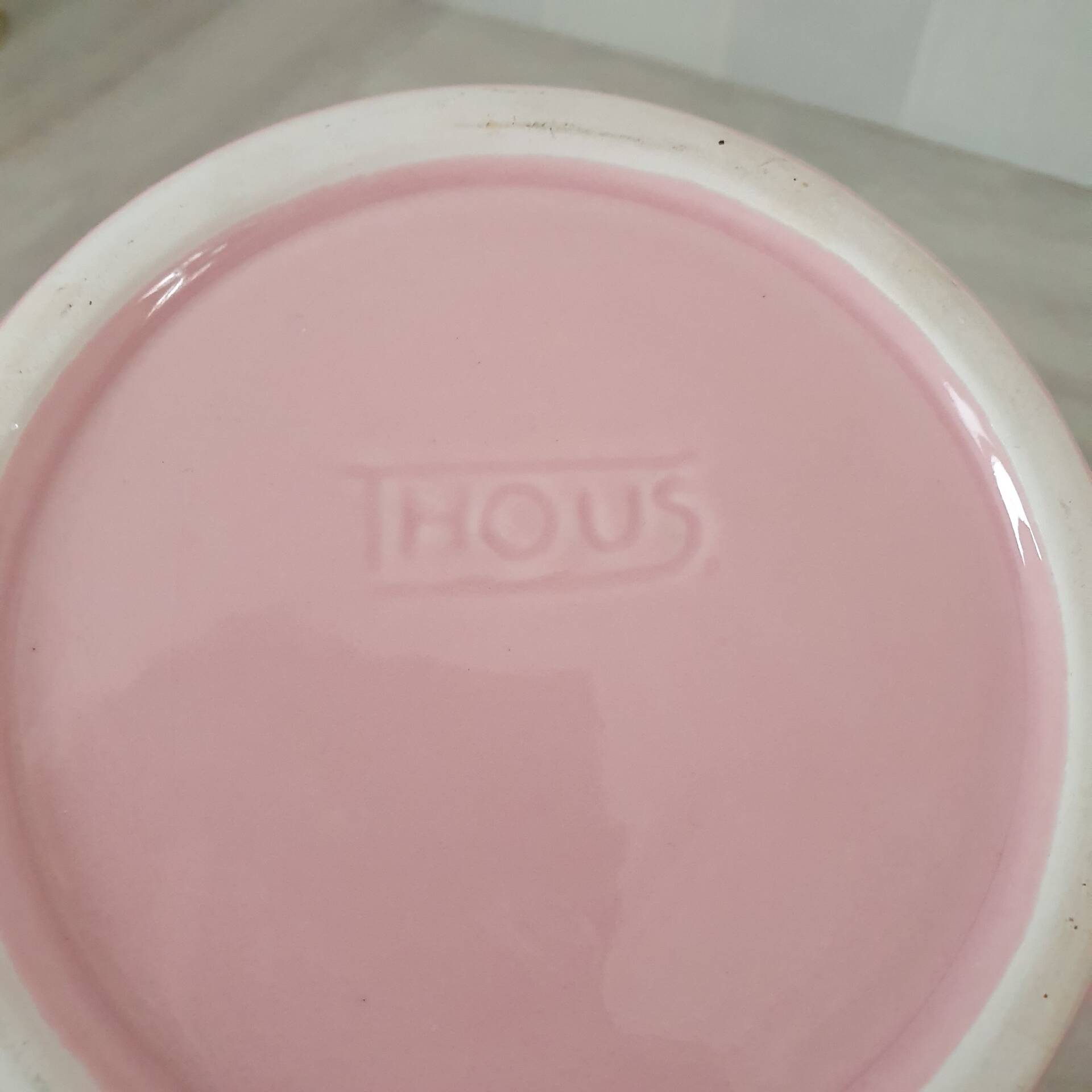 Set of pink and gold ceramic bathroom accessories