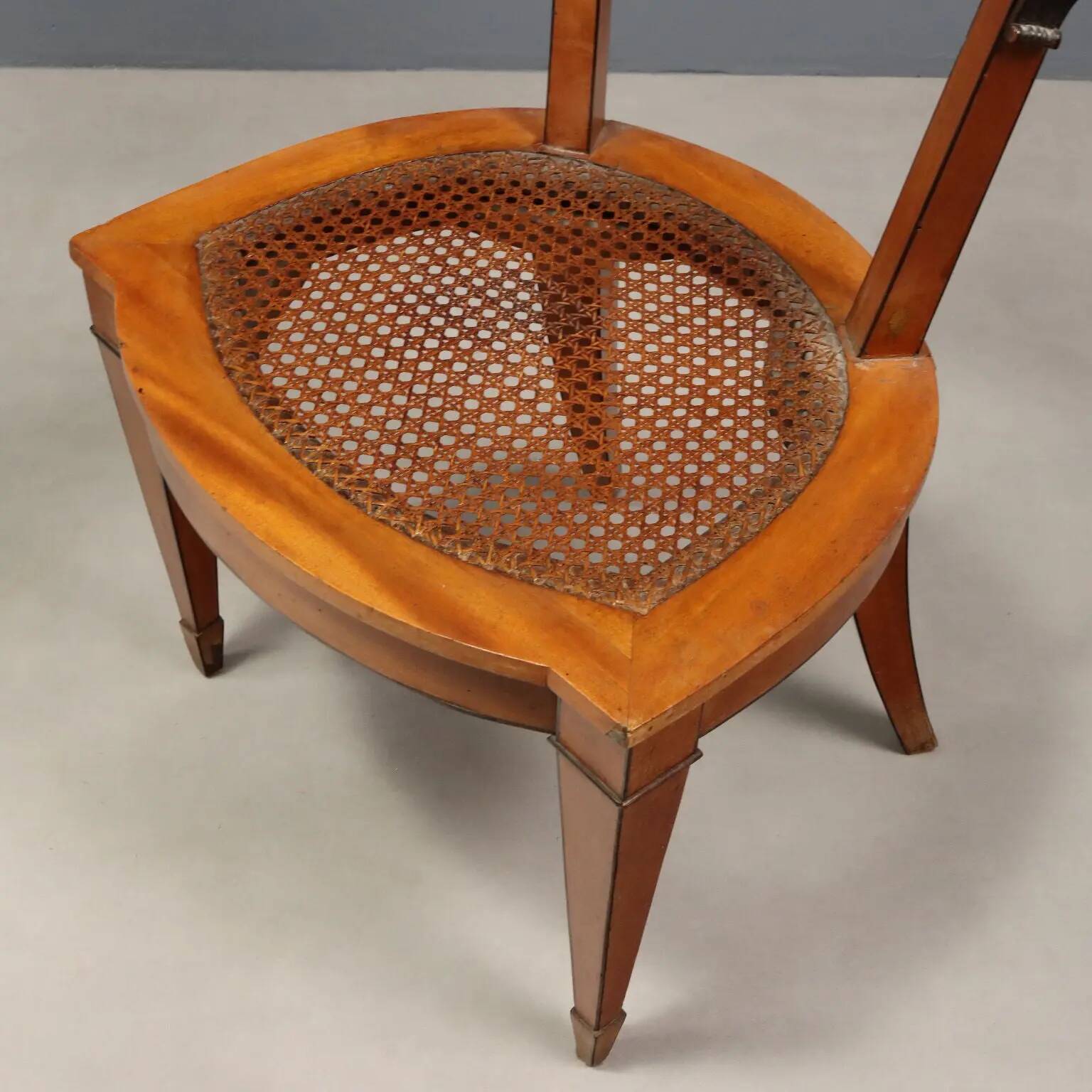 Antique Regency style chairs in mahogany and XX Century fabric.