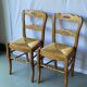 2 solid wood and straw dining chairs