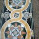 Table basse en mosaïque de marbre et pierres dures