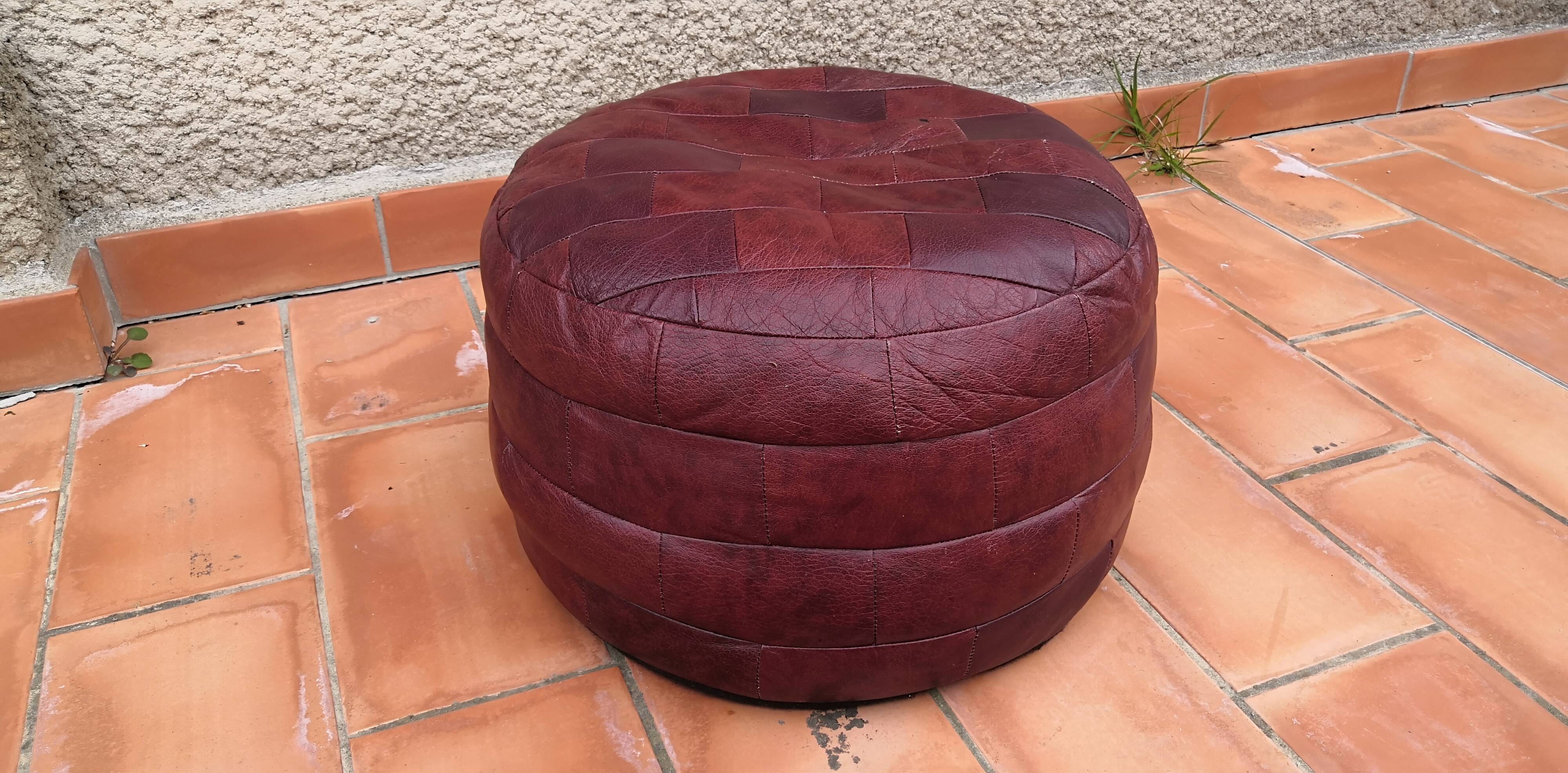 Pair of vintage poufs in burgundy leather patchwork, 1970