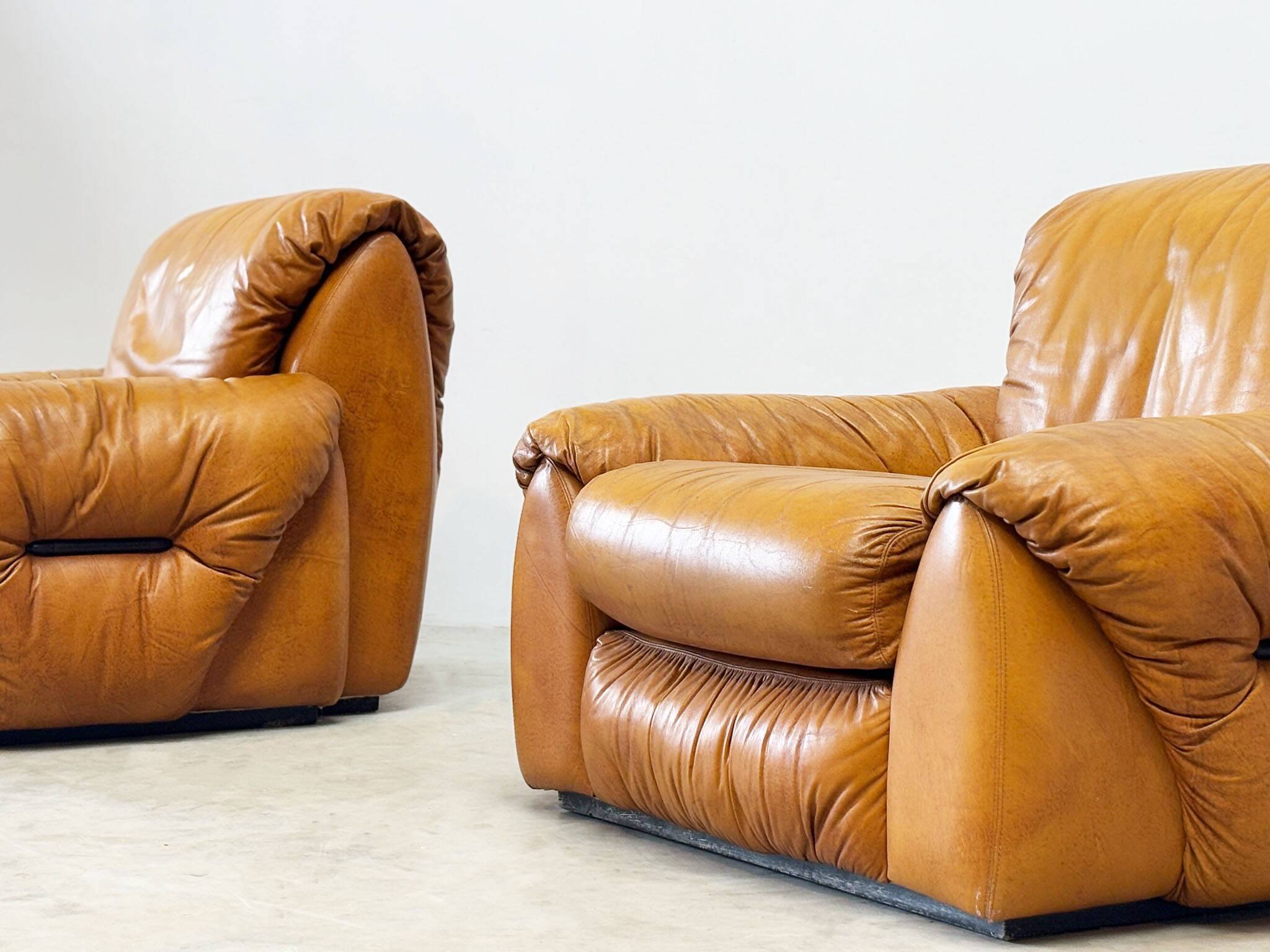 Set of two Italian cognac leather lounge chairs