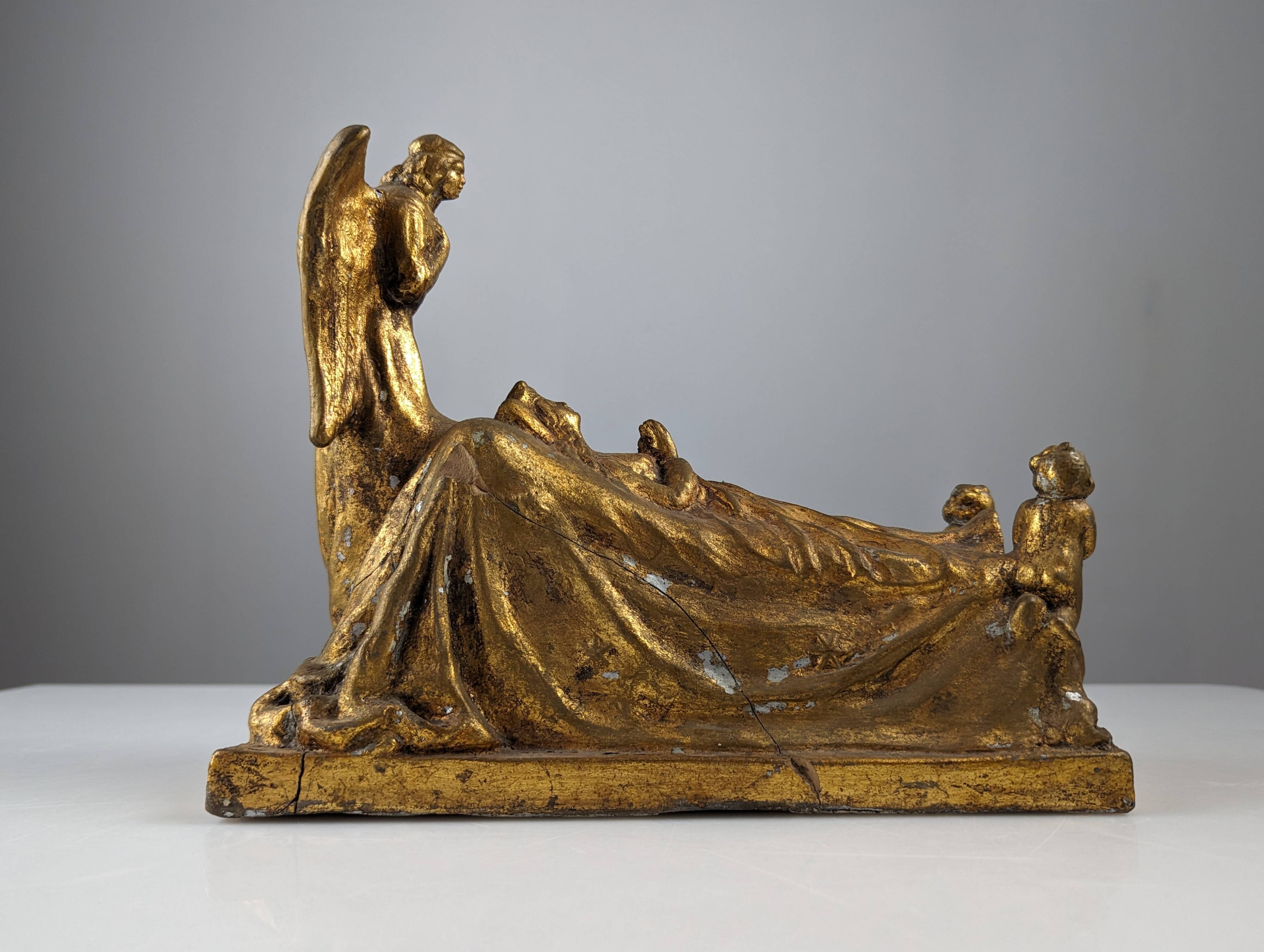 Queen and Angels sculpture in golden terracotta