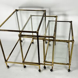 Mid-Century nesting set of three bar carts in brass and glass. Italy 1950s