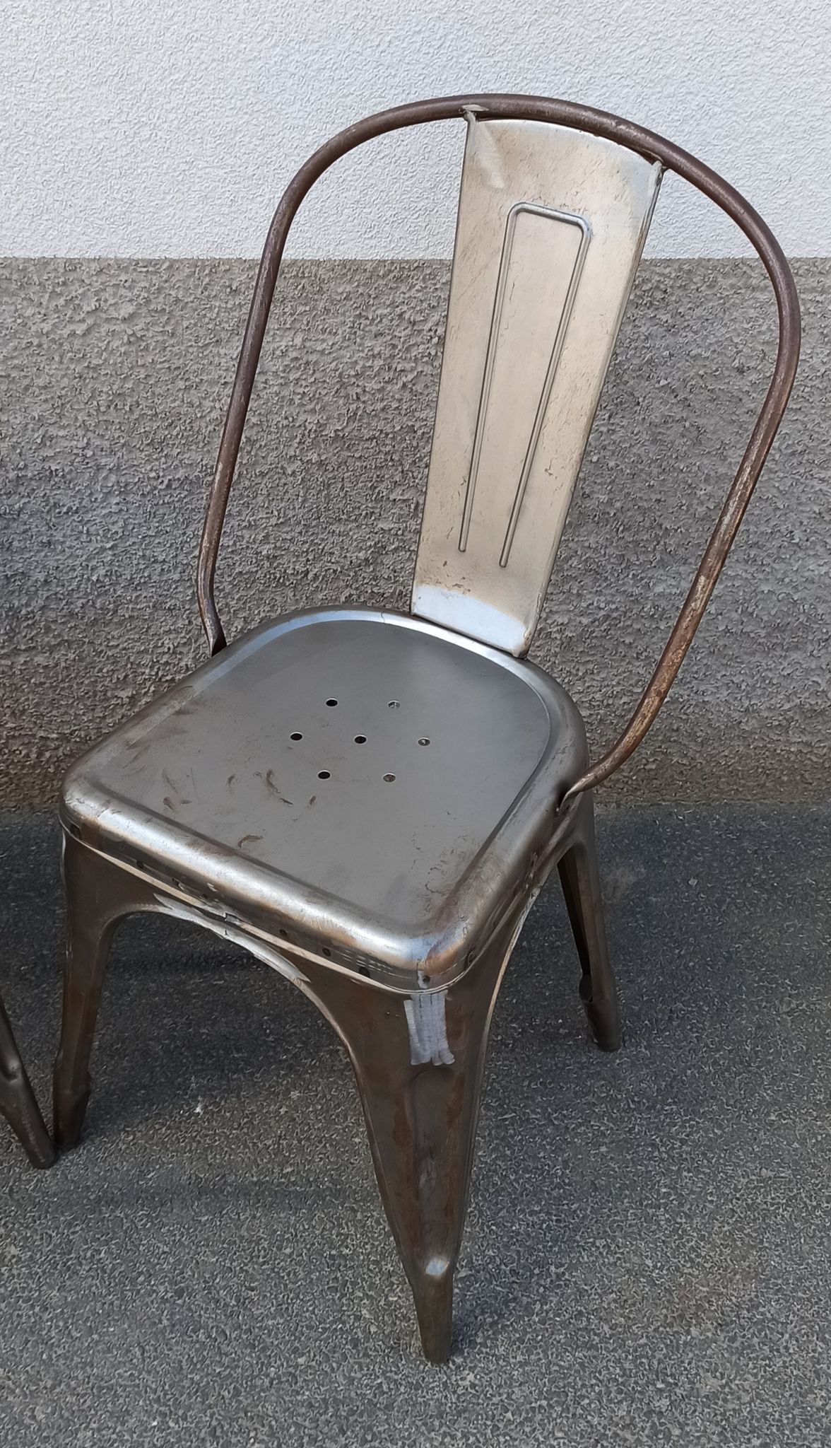 Pair of grey metal chairs