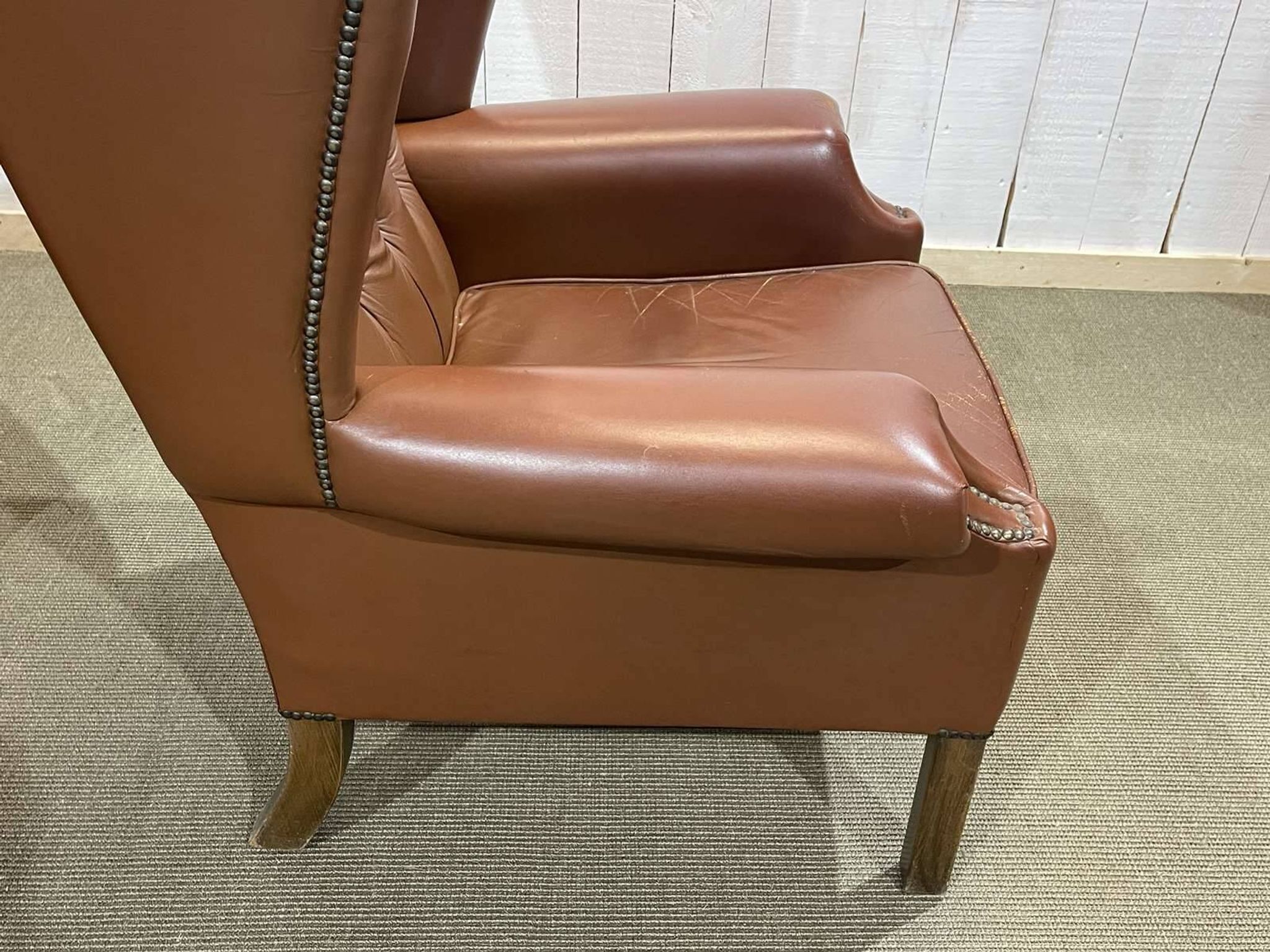 Pair of 1970s Chesterfield wingback chairs in brown leather
