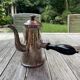 Silver chocolate pot with wooden handle and lid