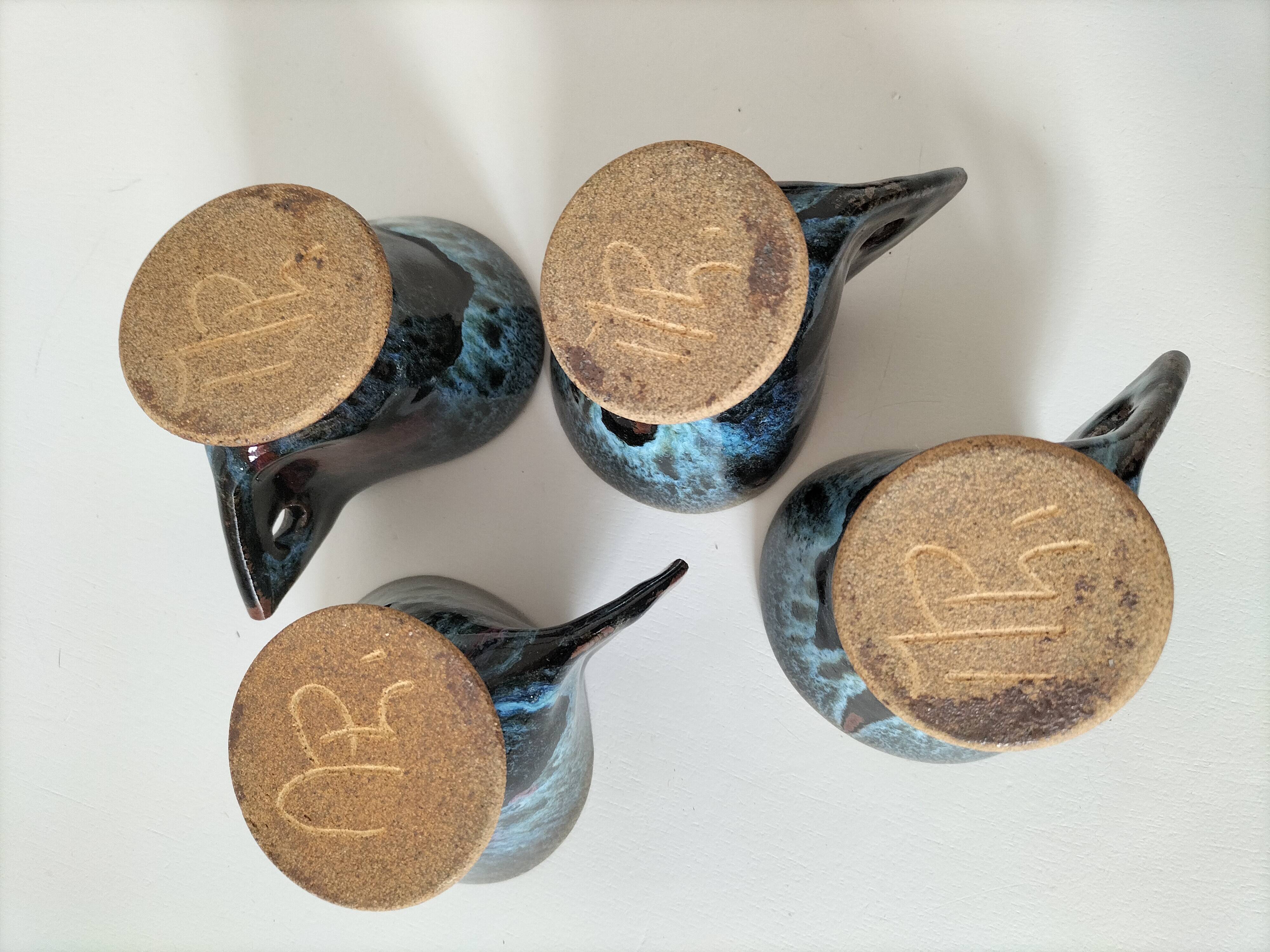 4 sculptural stoneware cups by Philippe Monroig