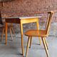 Together two Scandinavian chairs and its wooden and formica table