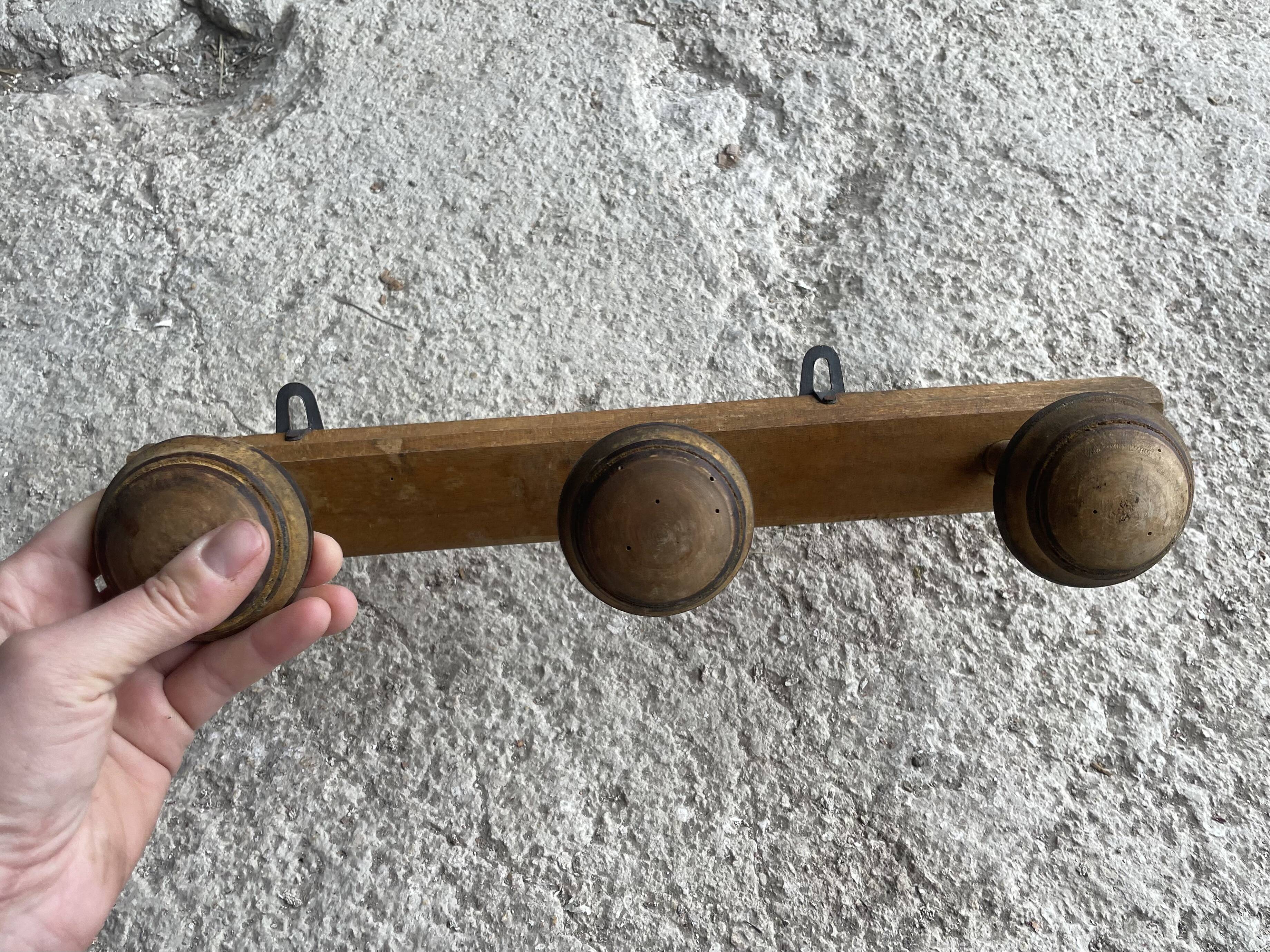Old wooden wall coat rack