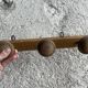 Old wooden wall coat rack