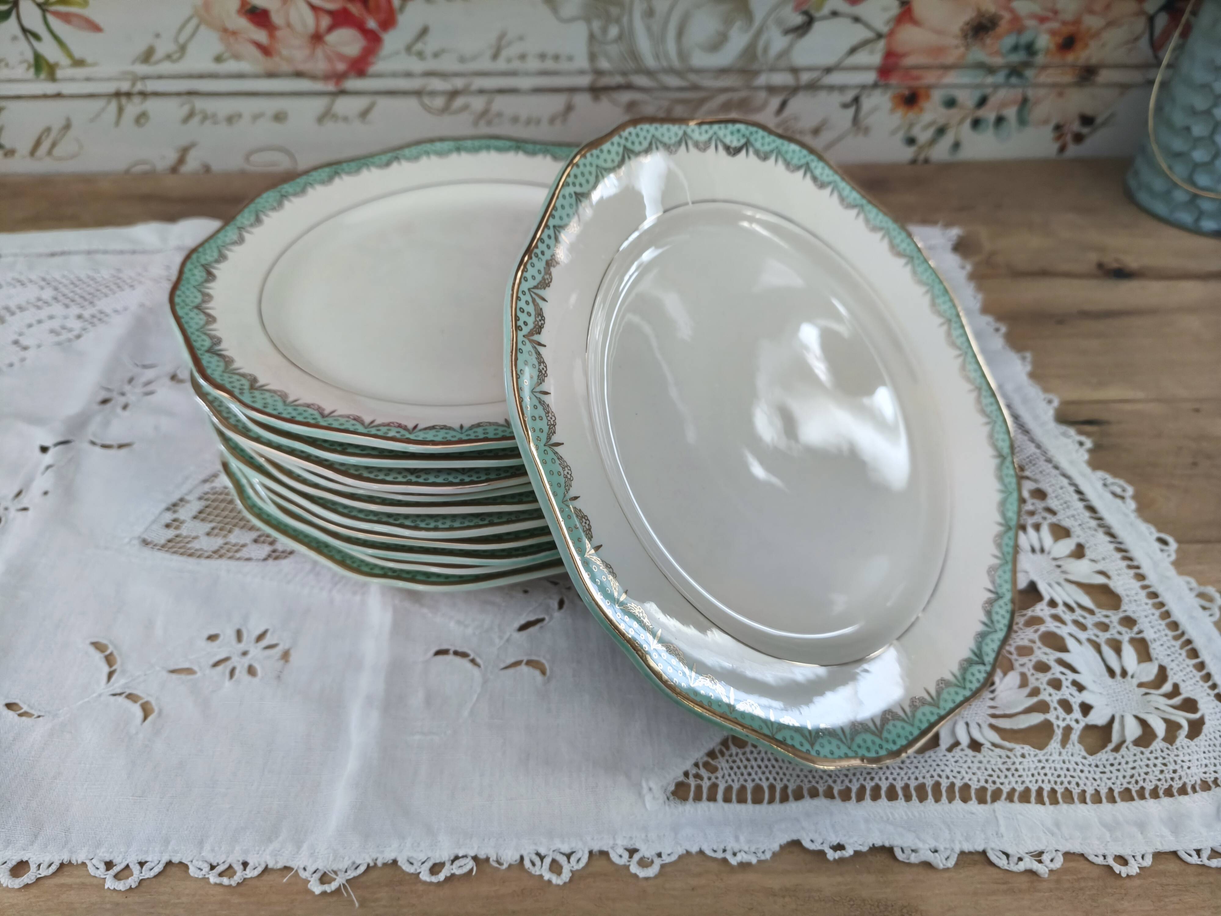 Set of 11 Longwy France earthenware dinner plates, Trianon model